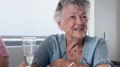 Grandmother smiles at table