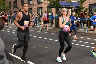 TJ Holmes and Amy Robach