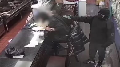 Shocking security video shows robber shooting restaurant customer at point-blank range during robbery in New York