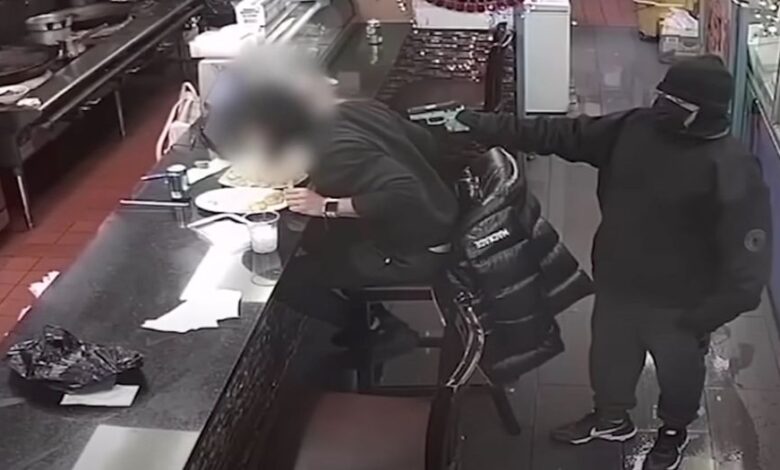 Shocking security video shows robber shooting restaurant customer at point-blank range during robbery in New York