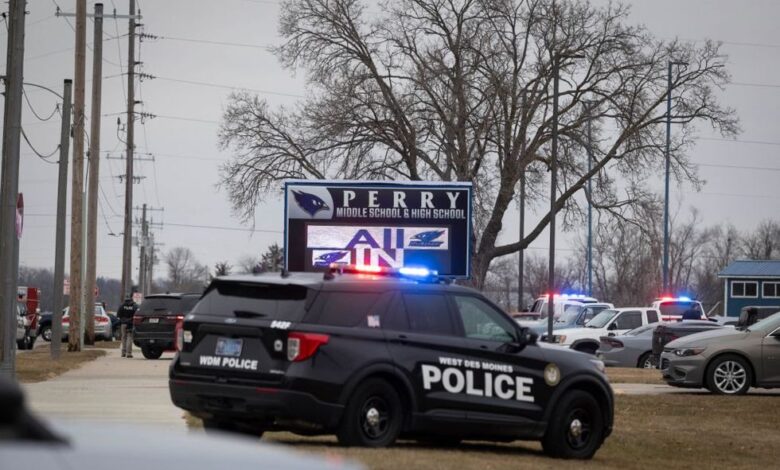 The Iowa high school principal – who was heralded as a hero for protecting students during the tragic shooting at Perry High School in January – died on Sunday, according to his family.