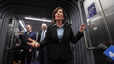 New subway cars with NY Governor Kathy Hochul and MTA Chairman Janno Lieber standing in a subway.