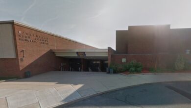 Hackensack High School building with a sign on the front