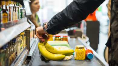 A supermarket cashier flipped out at me because I wouldn't pay for another woman's food