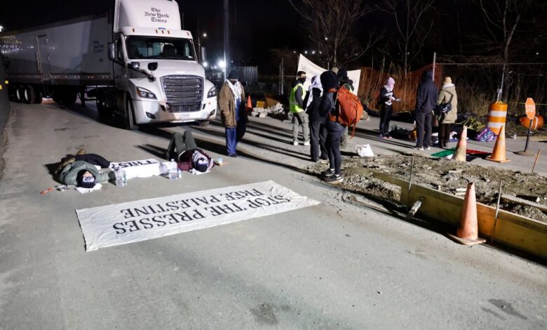 Anti-Israel protesters blocked the entrance to trucks so they could not load newspapers for delivery at the New York Times printing and offices.