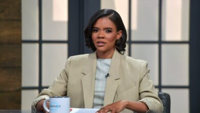 Candace Owens sitting at a table on the set of her talk show 'Candace' in Nashville, Tennessee on April 19, 2022