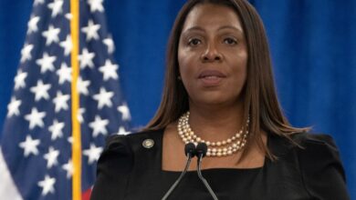 New York Attorney General Letitia James standing in front of a microphone during a press conference in Manhattan, New York City, USA