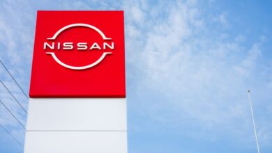 A sign at the South Austin Nissan dealership announcing the Honda and Nissan electric vehicle partnership in March 2024