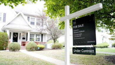 Compass Real Estate 'House Under Contract' sign posted in front of a house in Hawthorne, NJ