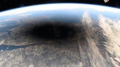 The Moon's shadow, or umbra, is pictured covering portions of the Canadian provinces of Quebec and New Brunswick and the American state of Maine in this photograph from the International Space Station as it soared into the solar eclipse from 261 miles above.