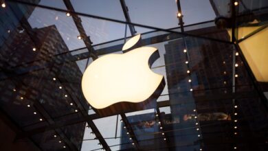 The Apple Inc. logo is displayed at the Upper West Side Apple store in New York, U.S., on Sunday, July 20, 2014. Apple Inc. is expected to release earnings data on July 22.