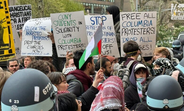 Pro-Palestine protesters demonstrate along NYPD police lines outside of Columbia University’s campus