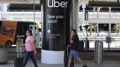 Uber sign at airport