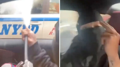 Unsuspecting NYPD officer caught on video being doused with fire extinguisher in sick prank