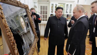 This picture taken on June 19, 2024 and released on June 20, 2024 from North Korea's official Korean Central News Agency (KCNA) via KNS shows North Korea's leader Kim Jong Un presenting a gift to Russia's President Vladimir Putin.