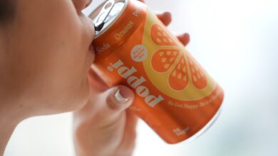 A person drinks Poppi, a prebiotic soda, on Wednesday, April 10, 2024, in New York.