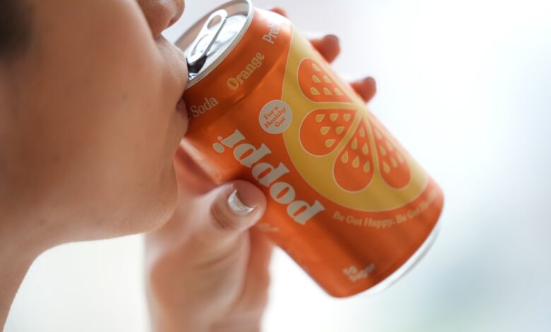 A person drinks Poppi, a prebiotic soda, on Wednesday, April 10, 2024, in New York.