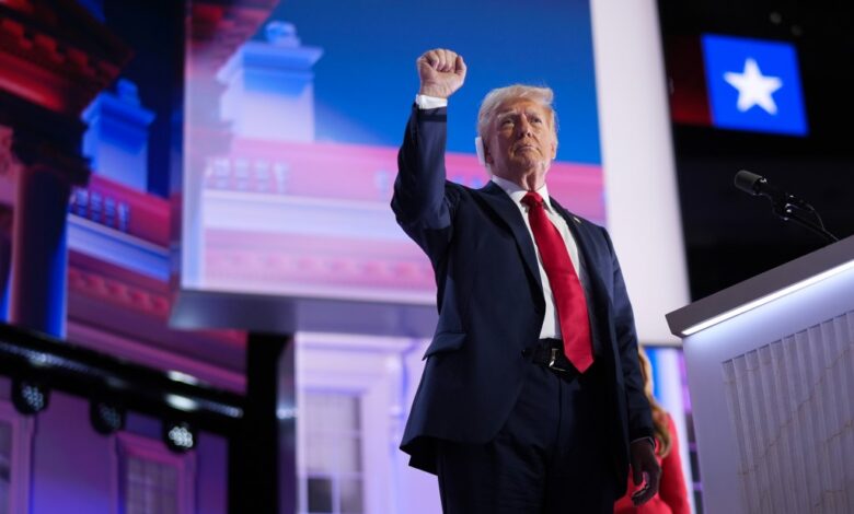 Former President Donald Trump raising his fist to the crowd after officially accepting the Republican presidential nomination at the 2024 RNC on July 18, 2024.