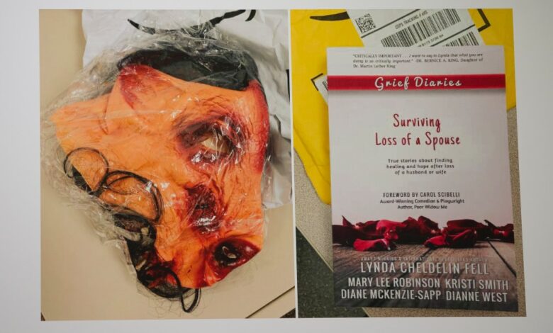 A placard displays photographs of evidence, a bloody pig mask and a book titled 'Surviving the Loss of a Spouse.'