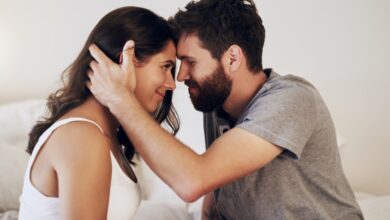 Shot of an affectionate young couple sharing a romantic moment in the bedroom at home