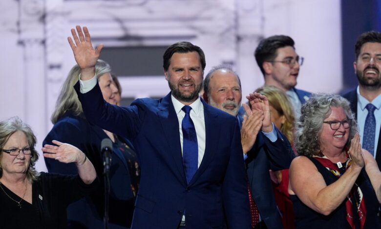 Republican vice presidential candidate Sen. JD Vance, R-Ohio, waves to supporters while on stage with supporters during the Republican National Convention on July 17, 2024.