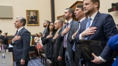 FBI Director Christopher Wray pledges allegiance prior to testifying before the House Judiciary Committee on Capitol Hill in Washington, DC on Wednesday, July 24, 2024.