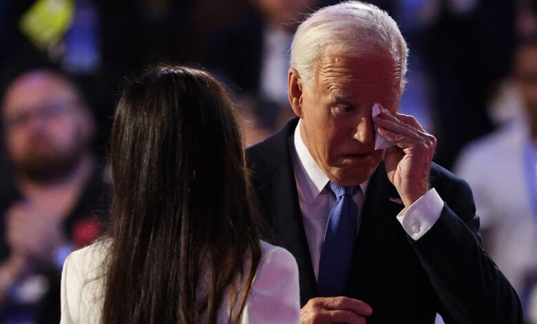 Joe Biden reacts as he joins his daughter Ashley onstage during Day one of the Democratic National Convention