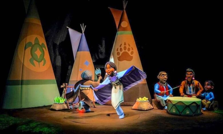 Updated scene from Peter Pan's Flight depicting Tiger Lily and her great-grandmother participating in a harvest celebration.