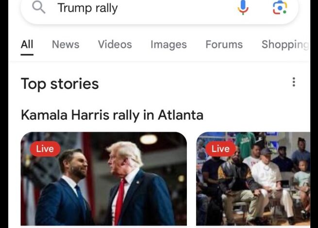 Elon Musk holding a smartphone displaying a Google search result for 'Trump rally' showing Kamala Harris as the top result