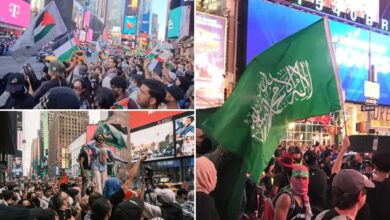 Hamas flag-wielding anti-Israel protesters show off portraits of killed terrorist leader Ismail Haniyeh in shocking Times Square rally