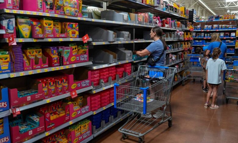 People shopping for school supplies inside a Walmart in Edmond, Oklahoma.