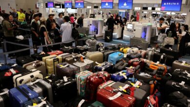 Bags and passengers at Delta counter on July 19.