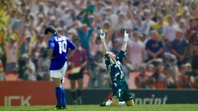 Brazilian goalkeeper Taffarel (right) celebrates after Roberto Baggio of Italy (left) misses his kick at the FIFA World Cup.