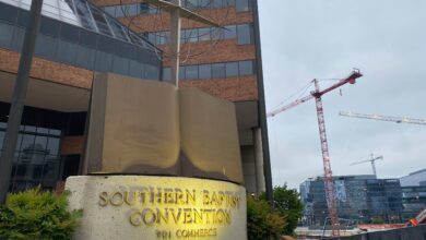 A cross and Bible sculpture stand outside the Southern Baptist Convention headquarters in Nashville.