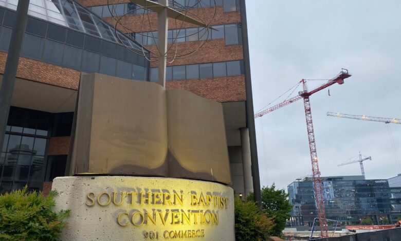 A cross and Bible sculpture stand outside the Southern Baptist Convention headquarters in Nashville.