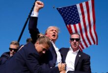 Trump pumping fist in air after first assassination attempt