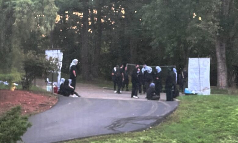 Anti-Israel protesters outside the home of Rep. Landsman.