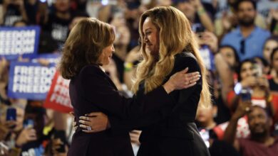 Musical artist Beyoncé, right, and Democratic presidential nominee Vice President Kamala Harris, left, embrace on stage during a campaign rally Friday, Oct. 25, 2024, in Houston. (AP Photo/Annie Mulligan)