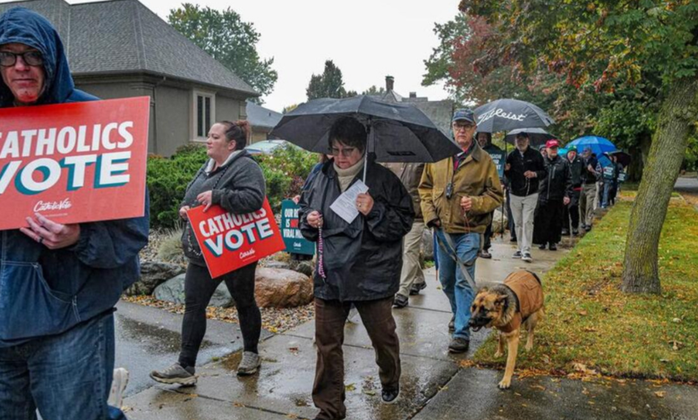 catholics rally outside home of gov. whitmer