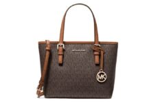 A brown and tan Michael Kors Jet Set handbag