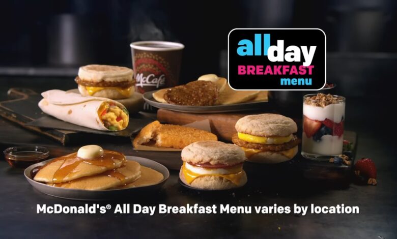 A group of sandwiches and a drink on a table, representative of McDonald's all day breakfast which is no longer served