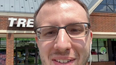 Grant Harting standing outside a Dollar Tree.