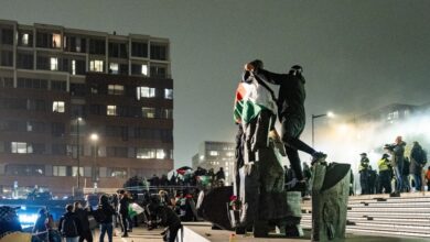 Pro-Palestinian protesters demonstrating at Amsterdam's Anton de Komplein square before the UEFA Europa League football match