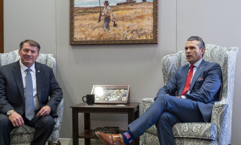 Sen. Mike Rounds, R-S.D., a member of the Senate Armed Services Committee, left, meets with Pete Hegseth, President-elect Donald Trump's nominee to be defense secretary, at the Capitol in Washington, Thursday, Dec. 5, 2024. (AP Photo/J. Scott Applewhite)