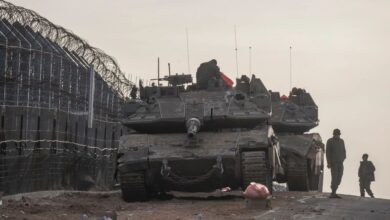 Israeli IDF soldiers on their tanks parked along the border fence with Syria in the northern Israeli-controlled Golan Heights on December 10, 2024.