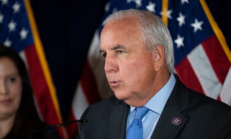 Rep. Carlos Gimenez addresses the media