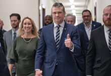 Pete Hegseth, President-elect Donald Trump's nominee to be Defense Secretary, gives a thumbs-up