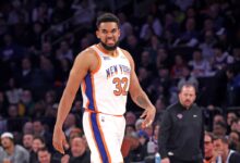 New York Knicks center Karl-Anthony Towns #32 reacting on the court during the first quarter in a game against Oklahoma City Thunder at Madison Square Garden