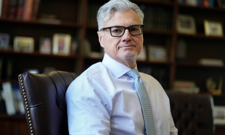 Judge Juan M. Merchan poses in his chambers in New York, March 14, 2024.