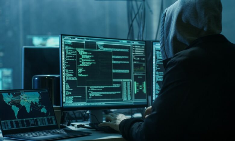 Dangerous Hooded Hacker Breaks into Government Data Servers and Infects Their System with a Virus.